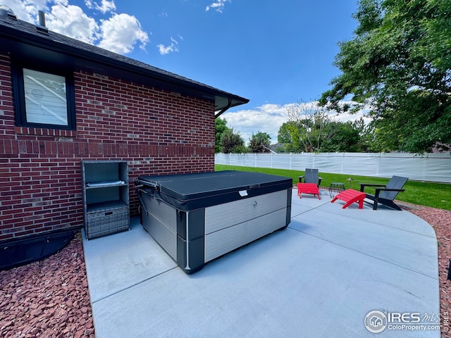 1806 Crestone Ct, Longmont, CO 80504 - view of patio / terrace with a hot tub