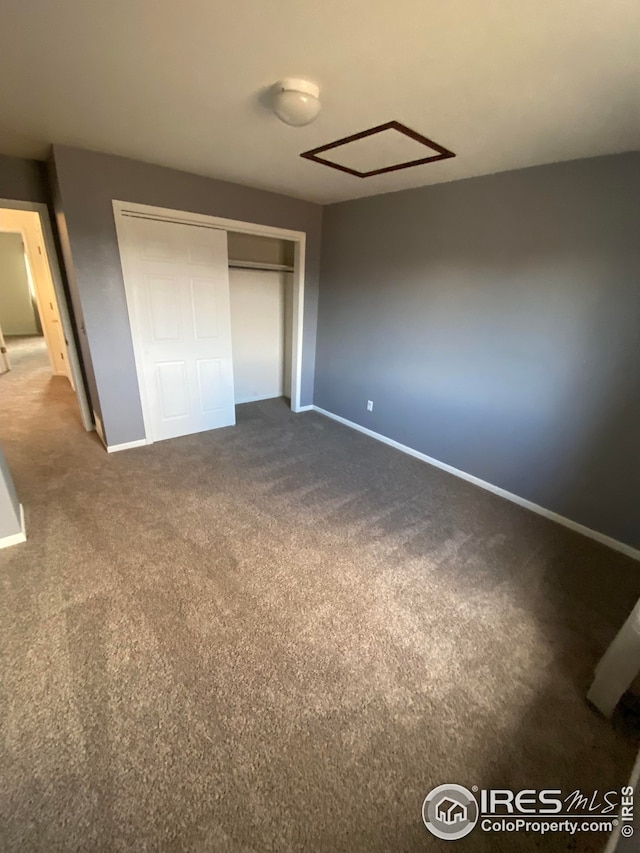 723 2nd St, Windsor, CO 80550 - unfurnished bedroom with dark colored carpet and a closet
