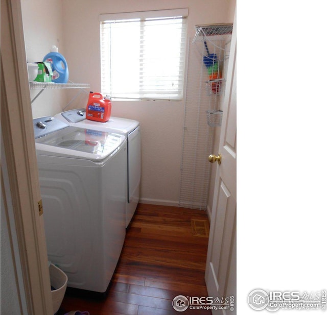 12609 Jersey Cir W, Thornton, CO 80602 - laundry area with independent washer and dryer and dark wood finished floors