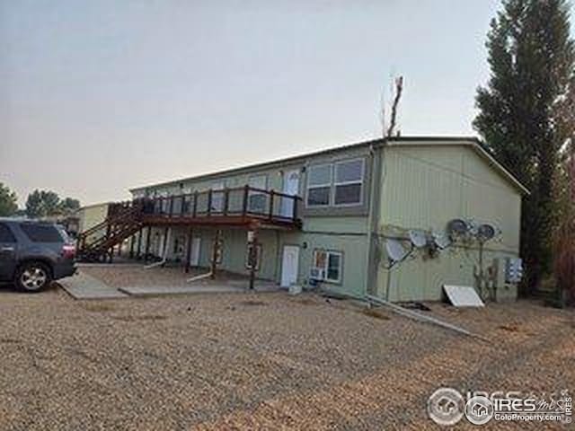 201 Applewood Ct, Brush, CO 80723 - view of front of house featuring stairs and a deck