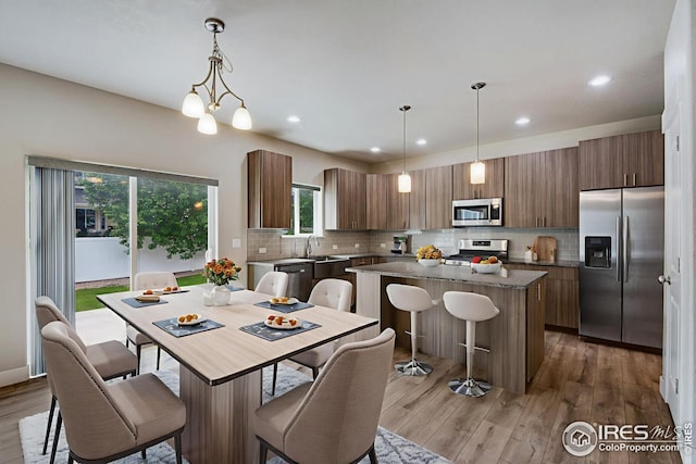 108 Wake St, Frederick, CO 80530 - dining room with wood finished floors and recessed lighting
