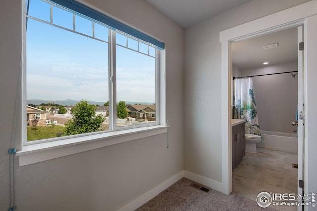 108 Wake St, Frederick, CO 80530 - hall featuring baseboards and light carpet