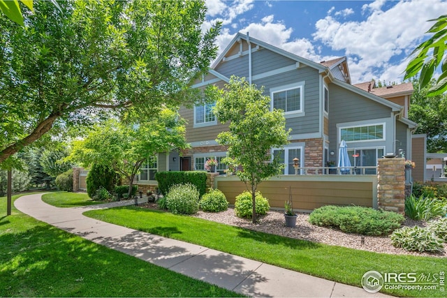 14300 Waterside Ln Unit E3, Broomfield, CO 80023 - view of front of property with stone siding