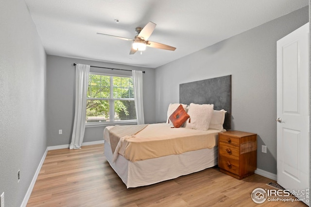 14300 Waterside Ln Unit E3, Broomfield, CO 80023 - bedroom with light wood-style floors and a ceiling fan