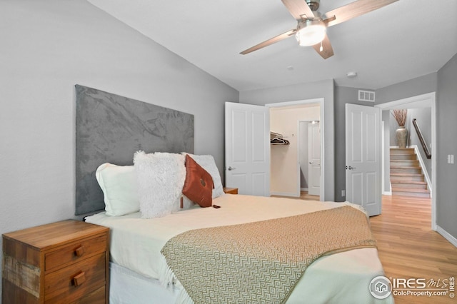14300 Waterside Ln Unit E3, Broomfield, CO 80023 - bedroom featuring wood finished floors and a ceiling fan