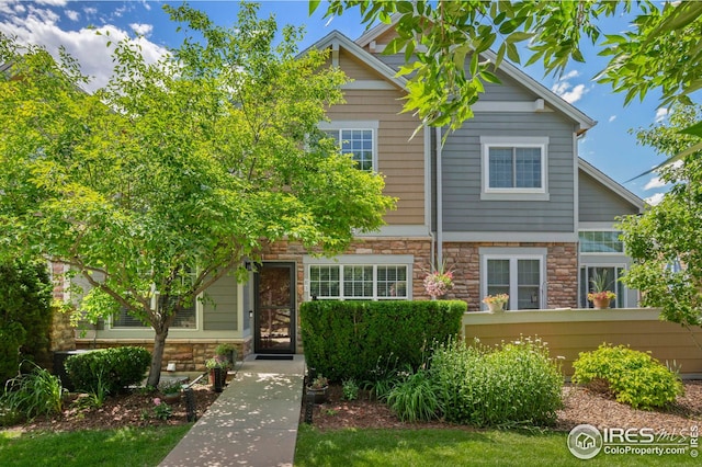 14300 Waterside Ln Unit E3, Broomfield, CO 80023 - view of front of house featuring stone siding