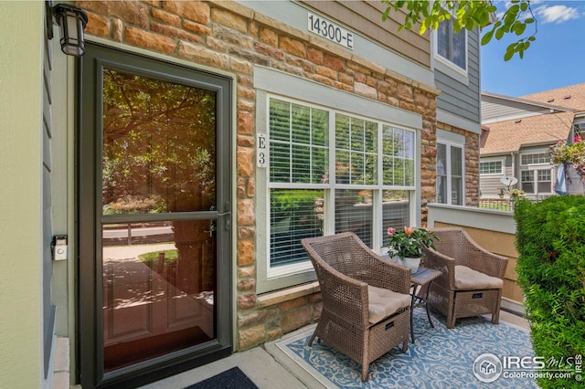 14300 Waterside Ln Unit E3, Broomfield, CO 80023 - entrance to property with stone siding