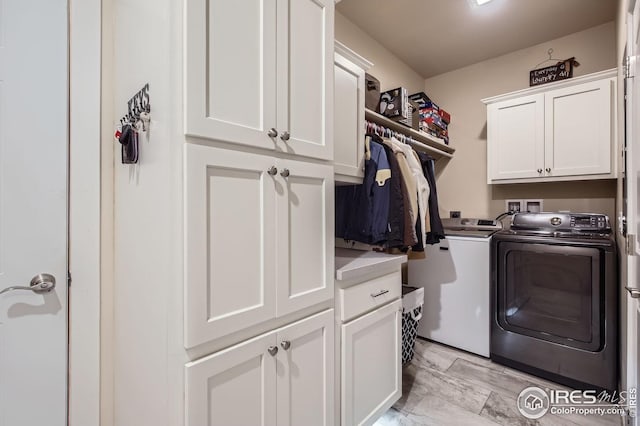7840 Cattail Grn, Frederick, CO 80530 - laundry room featuring separate washer and dryer and cabinet space