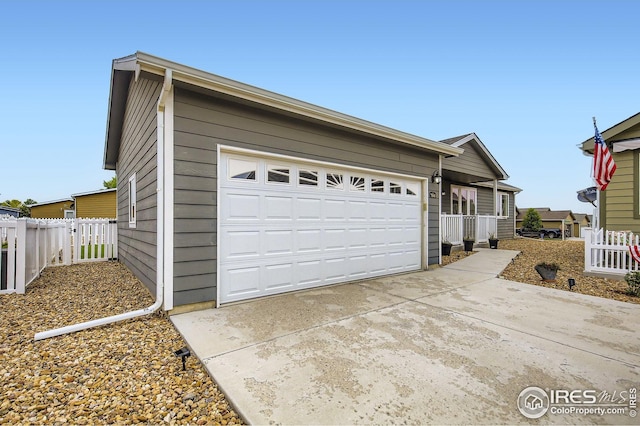 7840 Cattail Grn, Frederick, CO 80530 - garage with driveway