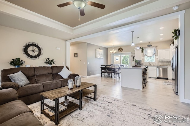 7840 Cattail Grn, Frederick, CO 80530 - living area with a ceiling fan, light wood-type flooring, a chandelier, and recessed lighting
