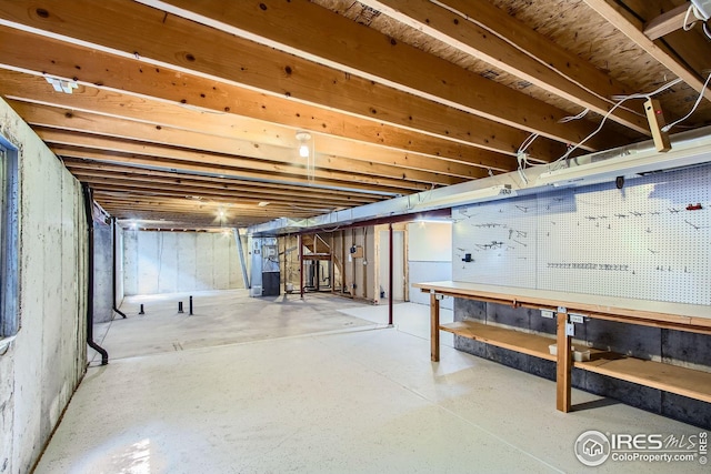10947 W 100th Dr, Westminster, CO 80021 - unfinished below grade area with a workshop area