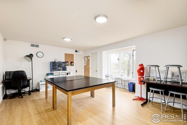 playroom with light hardwood / wood-style floors