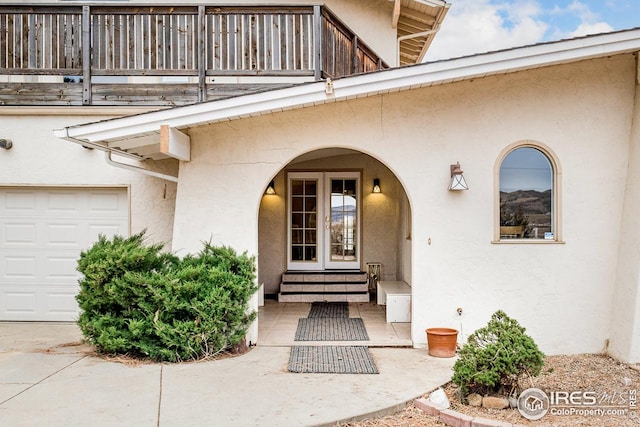 property entrance with a balcony