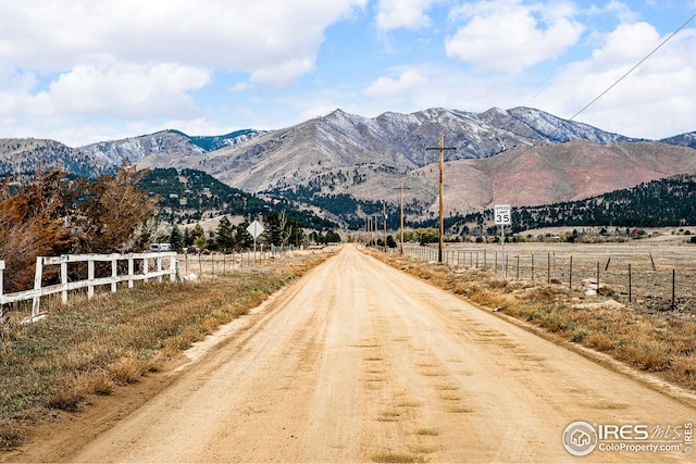 exterior space with a mountain view and a rural view