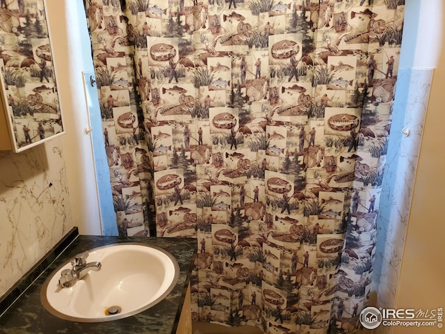 32246 Poudre Canyon Hwy, Bellvue, CO 80512 - bathroom featuring vanity and wallpapered walls
