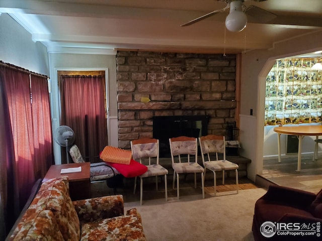 32246 Poudre Canyon Hwy, Bellvue, CO 80512 - living room featuring ceiling fan, a stone fireplace, and carpet floors