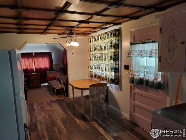 32246 Poudre Canyon Hwy, Bellvue, CO 80512 - dining area featuring a ceiling fan, dark wood-style floors, and baseboards