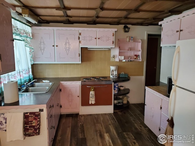 32246 Poudre Canyon Hwy, Bellvue, CO 80512 - kitchen featuring freestanding refrigerator, a sink, tasteful backsplash, dark wood finished floors, and white cabinetry