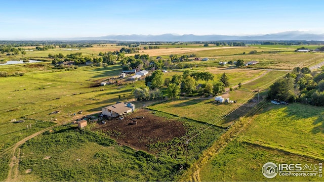 bird's eye view featuring a mountain view and a rural view