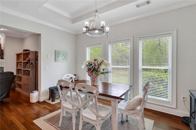 dining area with an inviting chandelier, visible vents, ornamental molding, baseboards, and dark wood-style flooring
