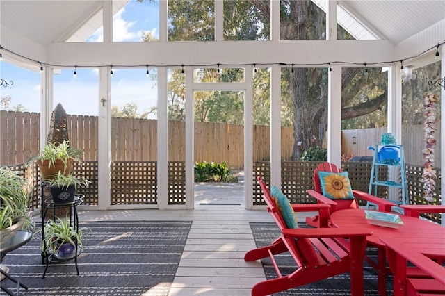 sunroom with vaulted ceiling