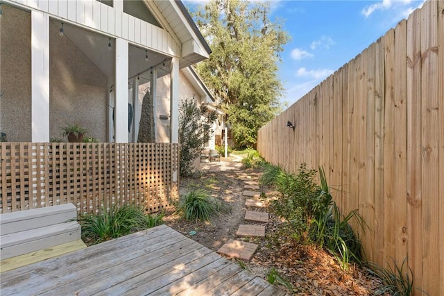 exterior space with a fenced backyard