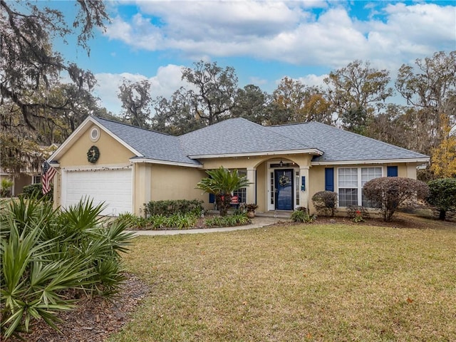 ranch-style house with a garage and a front yard