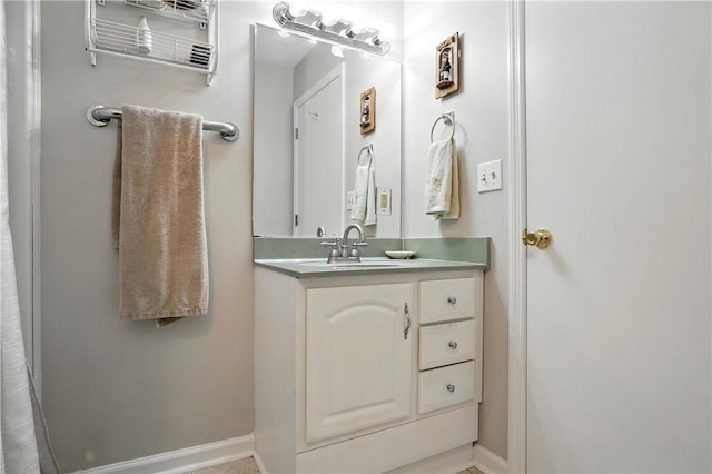 125 Enterprise St, Brunswick, GA 31525 - bathroom with vanity and baseboards