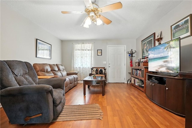 125 Enterprise St, Brunswick, GA 31525 - living room featuring light wood-style floors and a ceiling fan