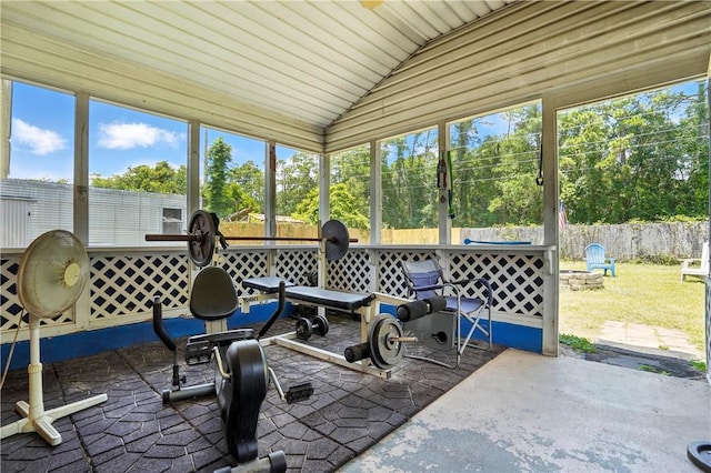 125 Enterprise St, Brunswick, GA 31525 - sunroom with lofted ceiling and view of scattered trees