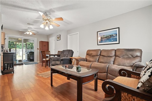125 Enterprise St, Brunswick, GA 31525 - living room featuring ceiling fan and light wood finished floors