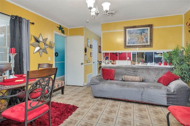 135 Kensington Dr, Brunswick, GA 31525 - living area with a textured ceiling, ornamental molding, and an inviting chandelier