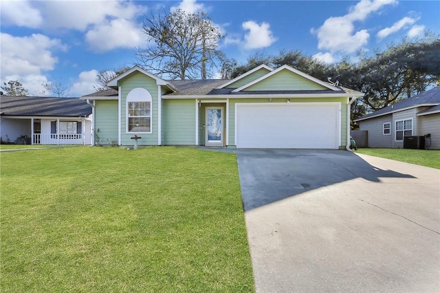 ranch-style house with an attached garage, driveway, and a front yard