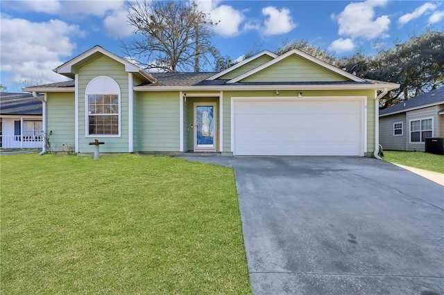 ranch-style home with a garage, driveway, a front lawn, and cooling unit