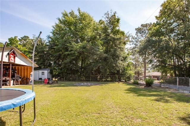 300 Community Dr, Waycross, GA 31501 - view of yard with a trampoline and view of scattered trees