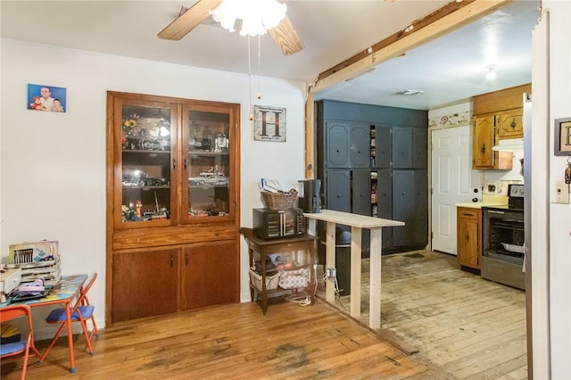 300 Community Dr, Waycross, GA 31501 - dining space featuring ceiling fan and light wood-style floors