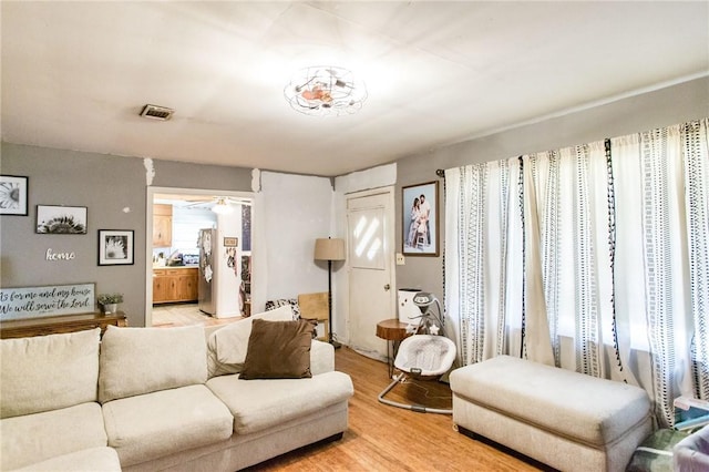 300 Community Dr, Waycross, GA 31501 - living room with light wood finished floors
