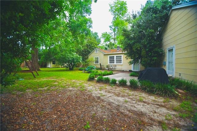 2108 Darling Ave, Waycross, GA 31501 - view of grassy yard featuring a patio
