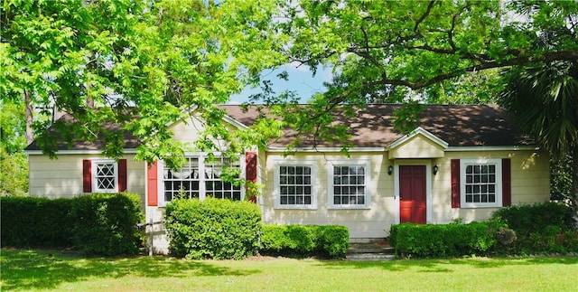 2108 Darling Ave, Waycross, GA 31501 - view of front of house featuring a front lawn and a shingled roof