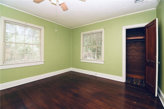 2108 Darling Ave, Waycross, GA 31501 - unfurnished bedroom featuring crown molding, hardwood / wood-style floors, baseboards, and a ceiling fan