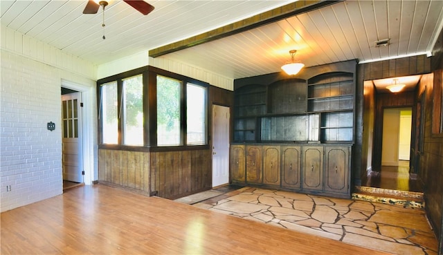 2108 Darling Ave, Waycross, GA 31501 - entryway with light wood-type flooring, a ceiling fan, brick wall, wood walls, and wood ceiling