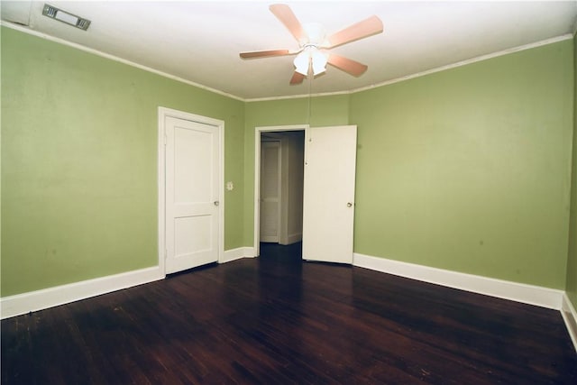 2108 Darling Ave, Waycross, GA 31501 - spare room featuring wood finished floors, a ceiling fan, baseboards, and crown molding