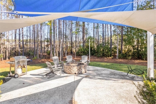 139 Allie Loop, Brunswick, GA 31525 - view of patio featuring grilling area and an outdoor fire pit