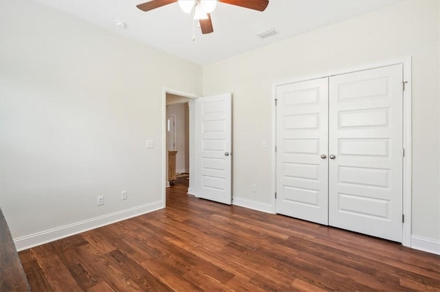 139 Allie Loop, Brunswick, GA 31525 - unfurnished bedroom featuring dark wood-style floors, a closet, and ceiling fan