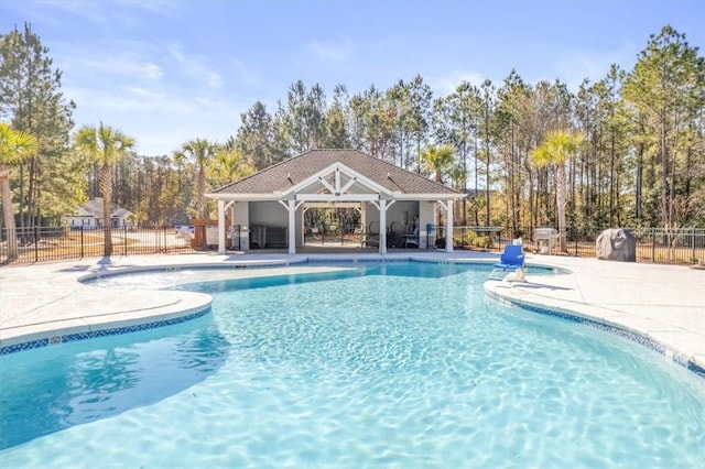 139 Allie Loop, Brunswick, GA 31525 - community pool featuring a patio, view of scattered trees, and a gazebo