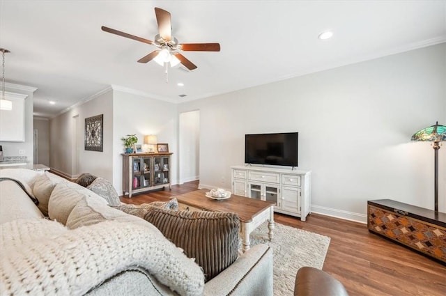 139 Allie Loop, Brunswick, GA 31525 - living area with ceiling fan, wood finished floors, ornamental molding, and recessed lighting