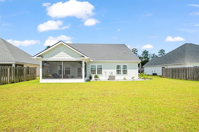 139 Allie Loop, Brunswick, GA 31525 - back of house featuring a sunroom and a fenced backyard
