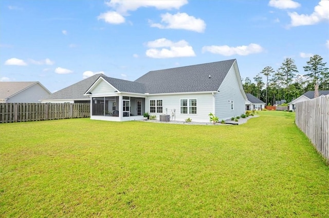 139 Allie Loop, Brunswick, GA 31525 - rear view of property featuring a sunroom and a fenced backyard