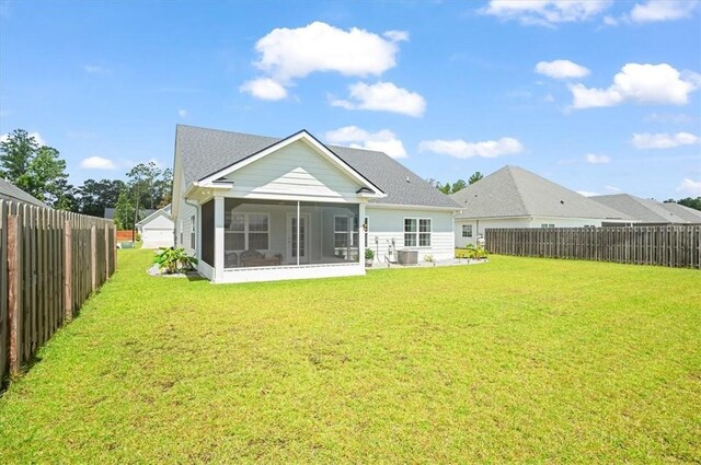 139 Allie Loop, Brunswick, GA 31525 - back of property featuring a sunroom and a fenced backyard