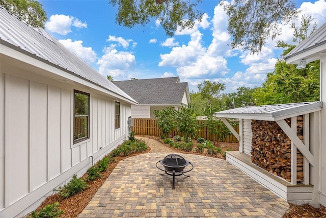 247 Circle Dr, Saint Simons Island, GA 31522 - view of patio / terrace featuring a fire pit